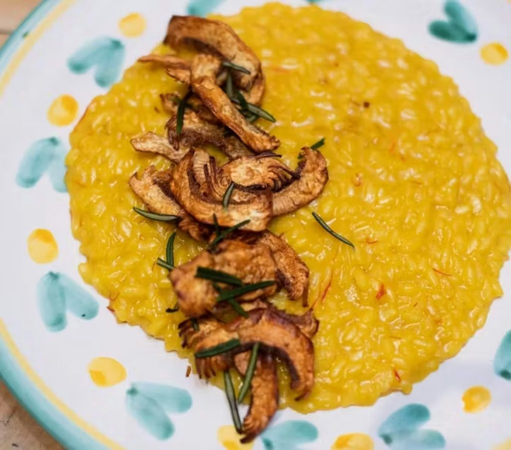Saffron risotto alla Milanese topped with crispy artichokes at Rosemary's