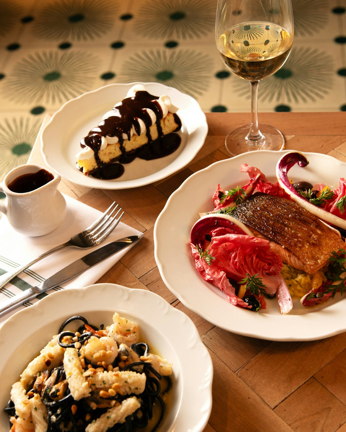 A spread of Valentine's Day dishes and drinks laid out on a table at Rosemary's